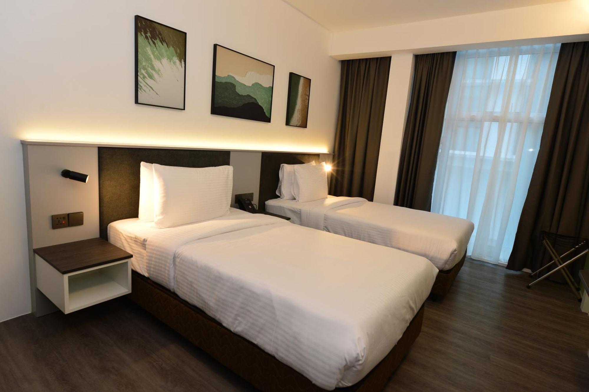 Rume Hotel Кучинг Екстериор снимка